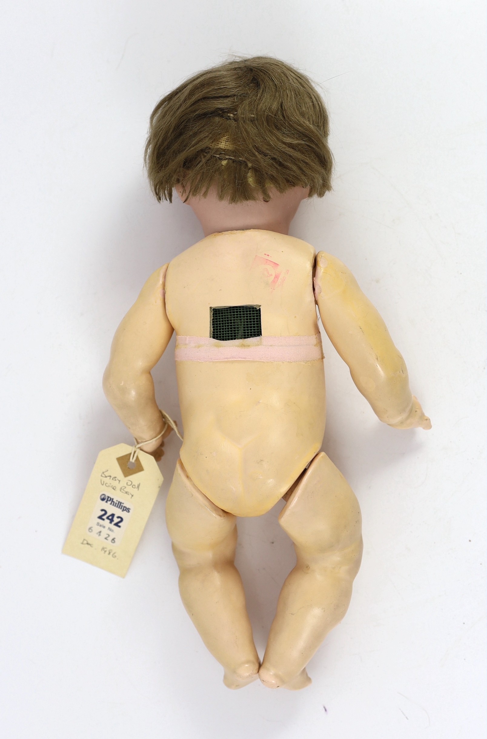 A Schutzmeister & Quendt bisque character doll, German, circa 1920, 14in.